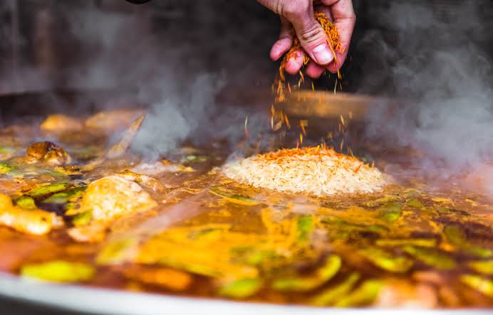 Paella being prepared by a private chef