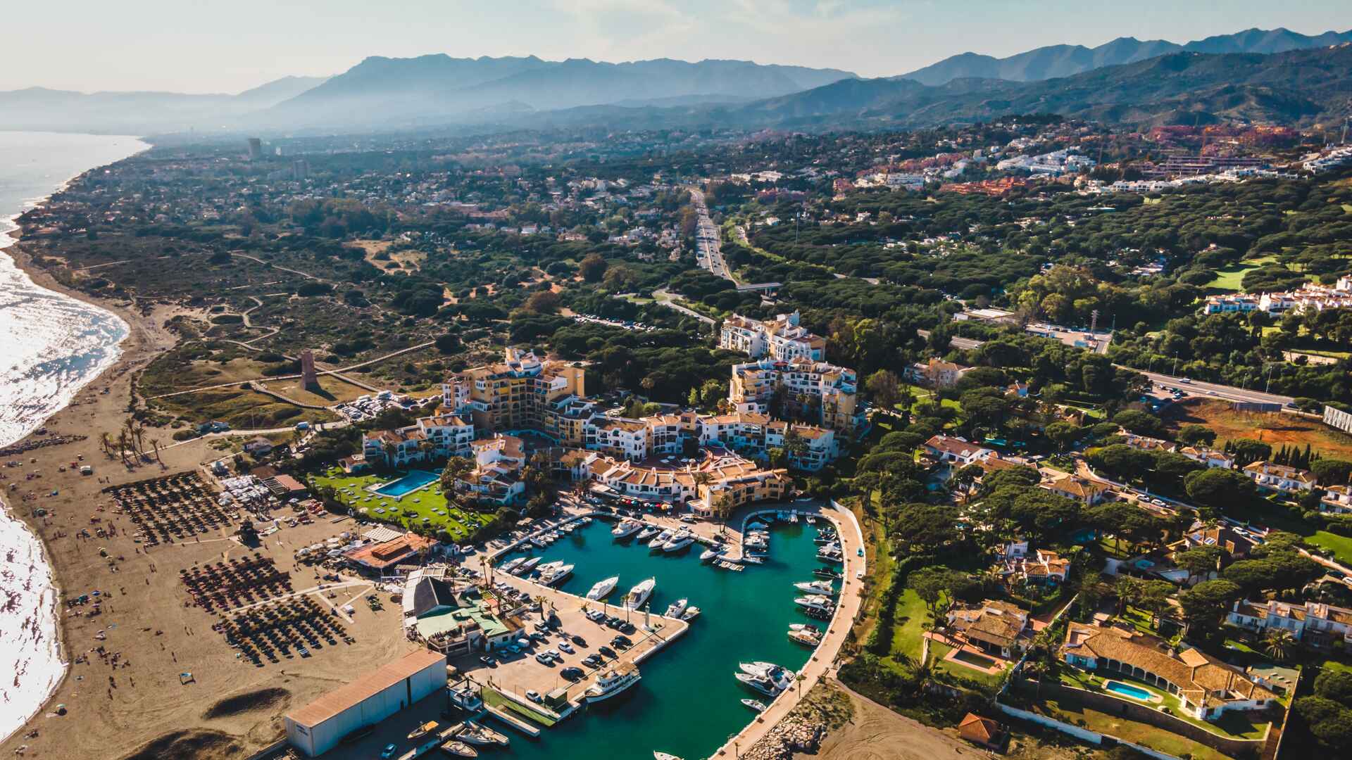 Cabopino beach, golden sand and bread breaking nature