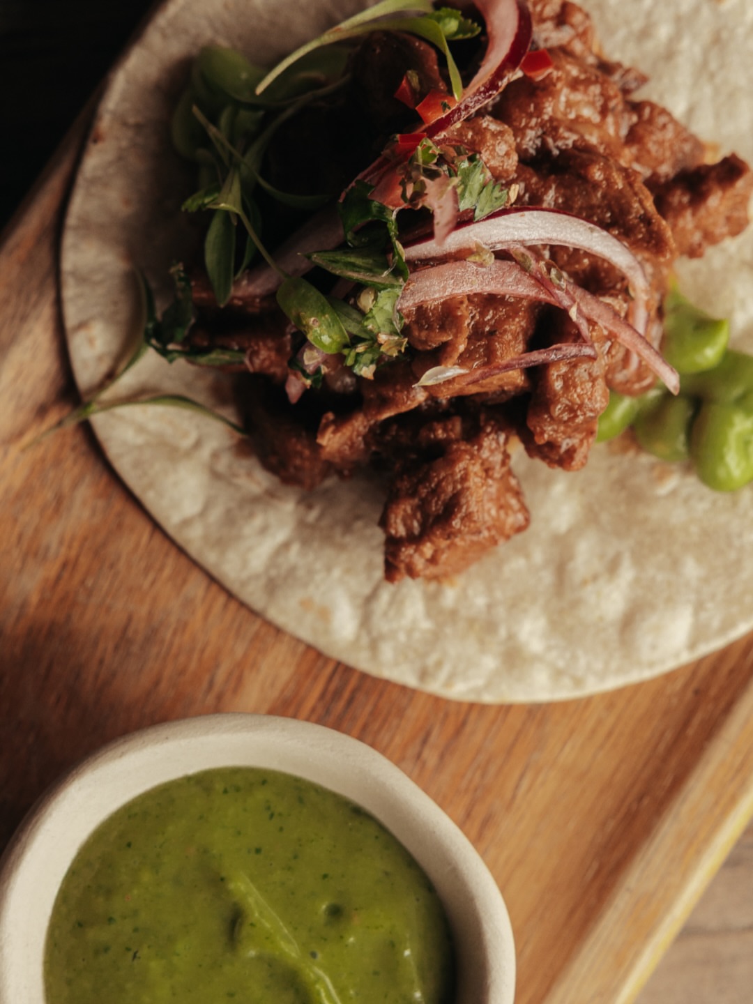 Chipotle-marinated beef tacos with avocado cream and all the attitude of Playa Padre. Book your table: +34 650 82 22 26 #PlayaPadre #Marbella